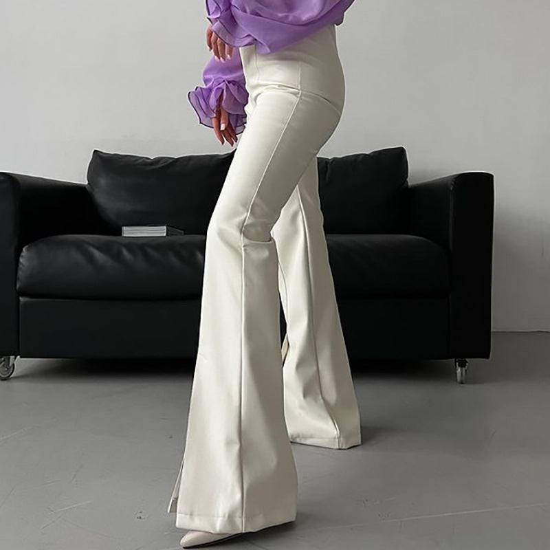 Sleek High-Rise Faux Leather Pants with Striking White Stitch Detail    